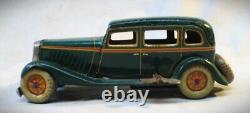 Vintage 1933 Ford Sedan Wind Up Tin Toy Car Made in Japan by Kuramochi