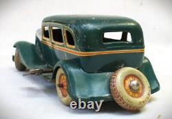 Vintage 1933 Ford Sedan Wind Up Tin Toy Car Made in Japan by Kuramochi
