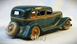 Vintage 1933 Ford Sedan Wind Up Tin Toy Car Made in Japan by Kuramochi