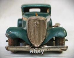 Vintage 1933 Ford Sedan Wind Up Tin Toy Car Made in Japan by Kuramochi