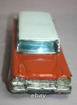 Vintage 1957 Bandai Plymouth Station Wagon Toy Tin Friction Car Orange White