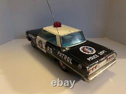 Vintage 1960's Chevrolet Impala Battery Operated Police Car. Tin Toy-Working