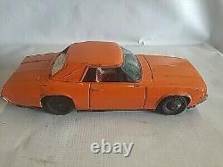 Vintage 1968 FORD THUNDERBIRD COUPE Orange Tin Friction Toy Car by Ichiko Japan