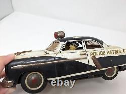 Vintage Antique MARUSAN KOSUGE Toy Made in Japan Ford Patrol Police Car 1952-54
