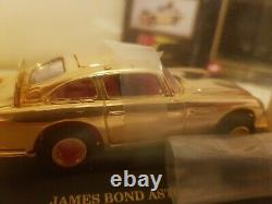 Vintage Corgi Toys James Bond Gold Aston Martin DB5 143 scale Box Worn
