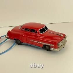 Vintage Cragstan Tin Remote Control Car & Box 1950's working headlights