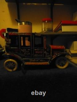 Vintage Lewis marks 10 lithograph wind-up toy car. Old Jalopy