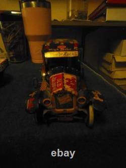 Vintage Lewis marks 10 lithograph wind-up toy car. Old Jalopy