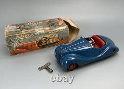 Vintage Schuco Akustico 2002 withOriginal Box / German Clockwork Wind-Up Toy Car
