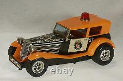 Vintage Taiyo Battery Powered Bump'N Go F. B. I. Godfather Car c1960