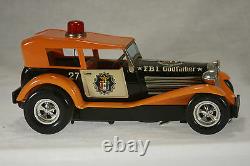 Vintage Taiyo Battery Powered Bump'N Go F. B. I. Godfather Car c1960