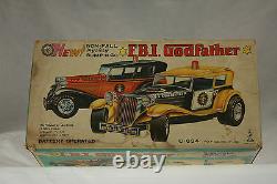 Vintage Taiyo Battery Powered Bump'N Go F. B. I. Godfather Car c1960