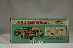 Vintage Taiyo Battery Powered Bump'N Go F. B. I. Godfather Car c1960