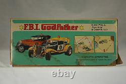 Vintage Taiyo Battery Powered Bump'N Go F. B. I. Godfather Car c1960