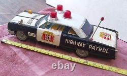 Vintage Tin Toy Car. Battery Operated Bump'N'Go (15 Inch) Police Buick. Works