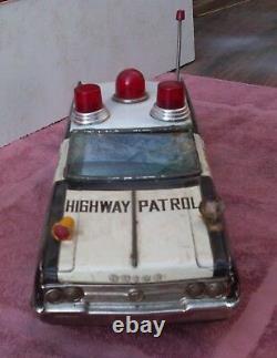 Vintage Tin Toy Car. Battery Operated Bump'N'Go (15 Inch) Police Buick. Works