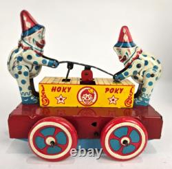 Vintage Tin Wyandotte HOKY POKY Wind-Up Clowns Hand Car- Good Condition Works