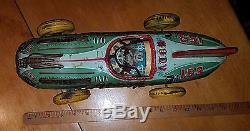 Vintage Yonezawa Atom Race Car has been played with