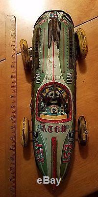 Vintage Yonezawa Atom Race Car has been played with