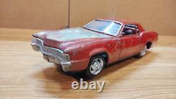 Vintage retro car litho tin toy Japan. Cadillac Fleetwood Eldorado car Battery