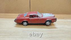 Vintage retro car litho tin toy Japan. Cadillac Fleetwood Eldorado car Battery