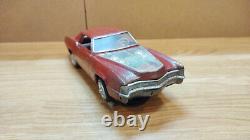 Vintage retro car litho tin toy Japan. Cadillac Fleetwood Eldorado car Battery