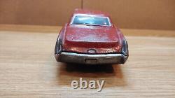 Vintage retro car litho tin toy Japan. Cadillac Fleetwood Eldorado car Battery