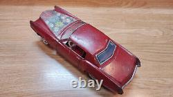 Vintage retro car litho tin toy Japan. Cadillac Fleetwood Eldorado car Battery