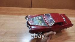 Vintage retro car litho tin toy Japan. Cadillac Fleetwood Eldorado car Battery