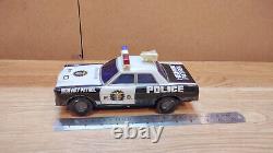 Vintage retro car litho tin toy Japan. PD Highway patrol Police Japan Battery