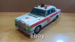 Vintage retro car litho tin toys. Ambulance Mercedes Benz car tin friction Japan