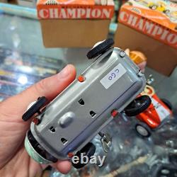 Vintage tin racing car japan kanto toys boy and girl working