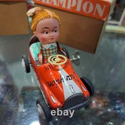 Vintage tin racing car japan kanto toys boy and girl working
