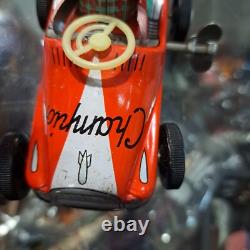 Vintage tin racing car japan kanto toys boy and girl working