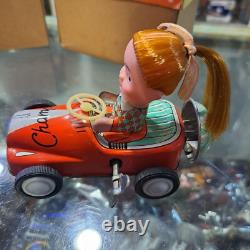 Vintage tin racing car japan kanto toys boy and girl working