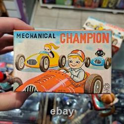 Vintage tin racing car japan kanto toys boy and girl working