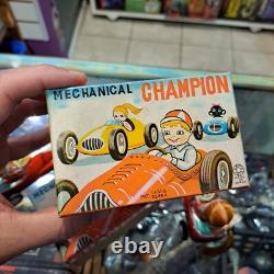 Vintage tin racing car japan kanto toys boy and girl working