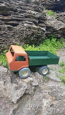 Vintage toy truck, large metal MAZ. Soviet-made car for children in the USSR