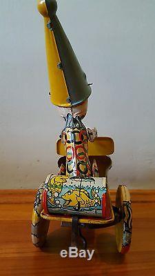 Vintage wind up tin toy. Unique Art 30s. Artie the Clown crazy car. Mint