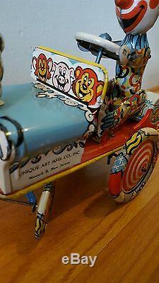 Vintage wind up tin toy. Unique Art 30s. Artie the Clown crazy car. Mint
