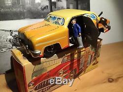 Western Germany Wind Up Tin Car Stops, Driver Comes Out, Drive Away Orig. Box