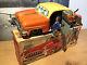Western Germany Wind Up Tin Car Stops, Driver Comes Out, Drive Away Orig. Box