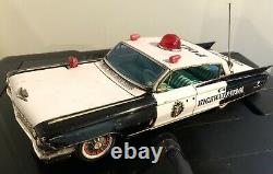 Yonezawa Tinplate Friction Cadillac Police Patrol Car- Japan 1961