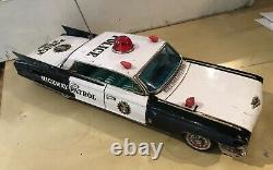 Yonezawa Tinplate Friction Cadillac Police Patrol Car- Japan 1961