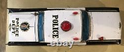 Yonezawa Tinplate Friction Cadillac Police Patrol Car- Japan 1961