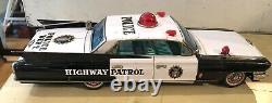 Yonezawa Tinplate Friction Cadillac Police Patrol Car- Japan 1961