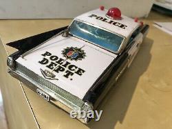 Yonezawa Tinplate Friction Cadillac Police Patrol Car- Japan 1961