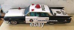 Yonezawa Tinplate Friction Cadillac Police Patrol Car- Japan 1961